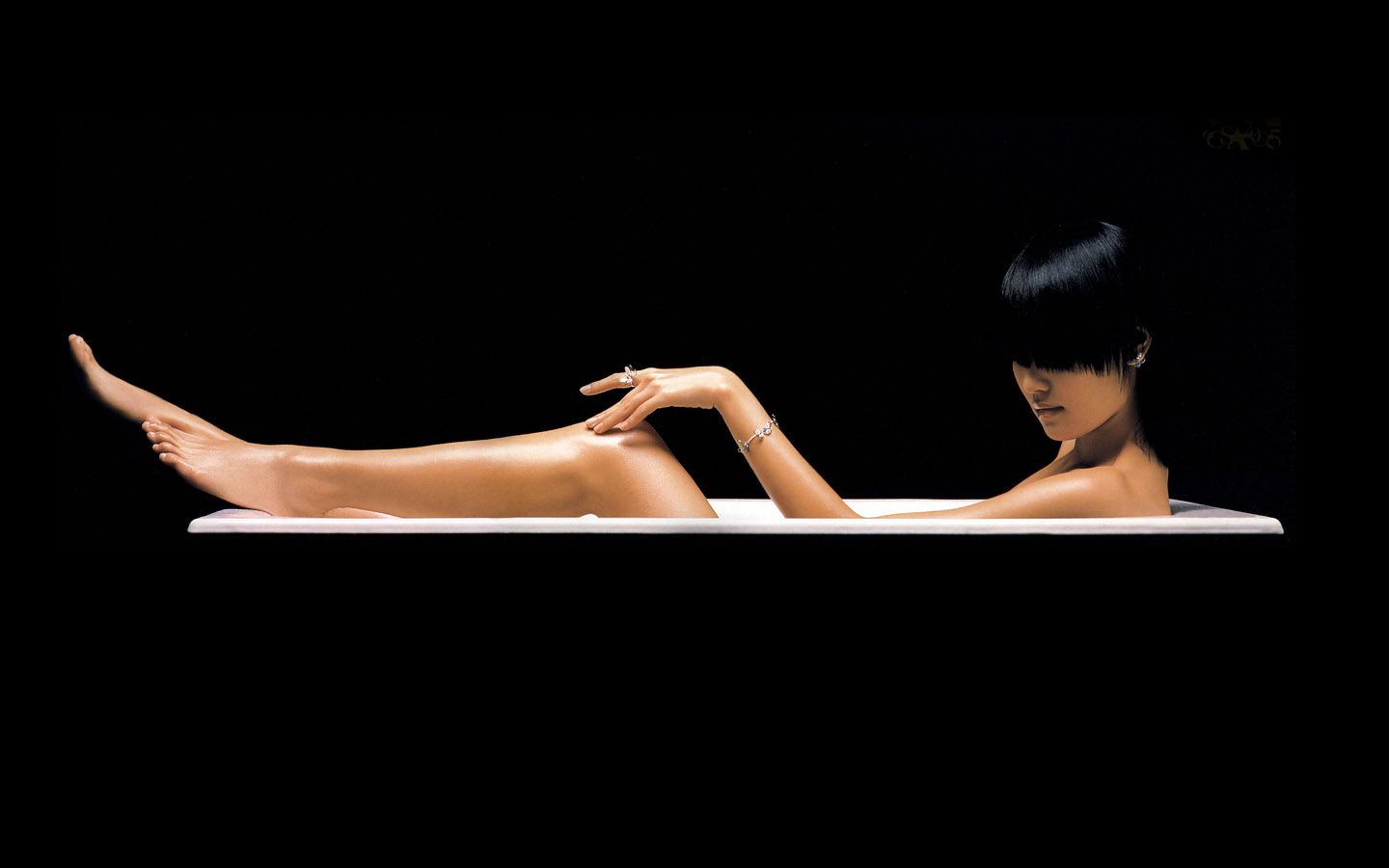 dark haired girl in tub