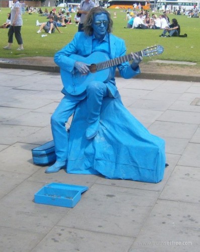 blue man plays the blues
