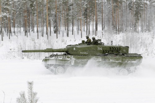 green tank in white snow