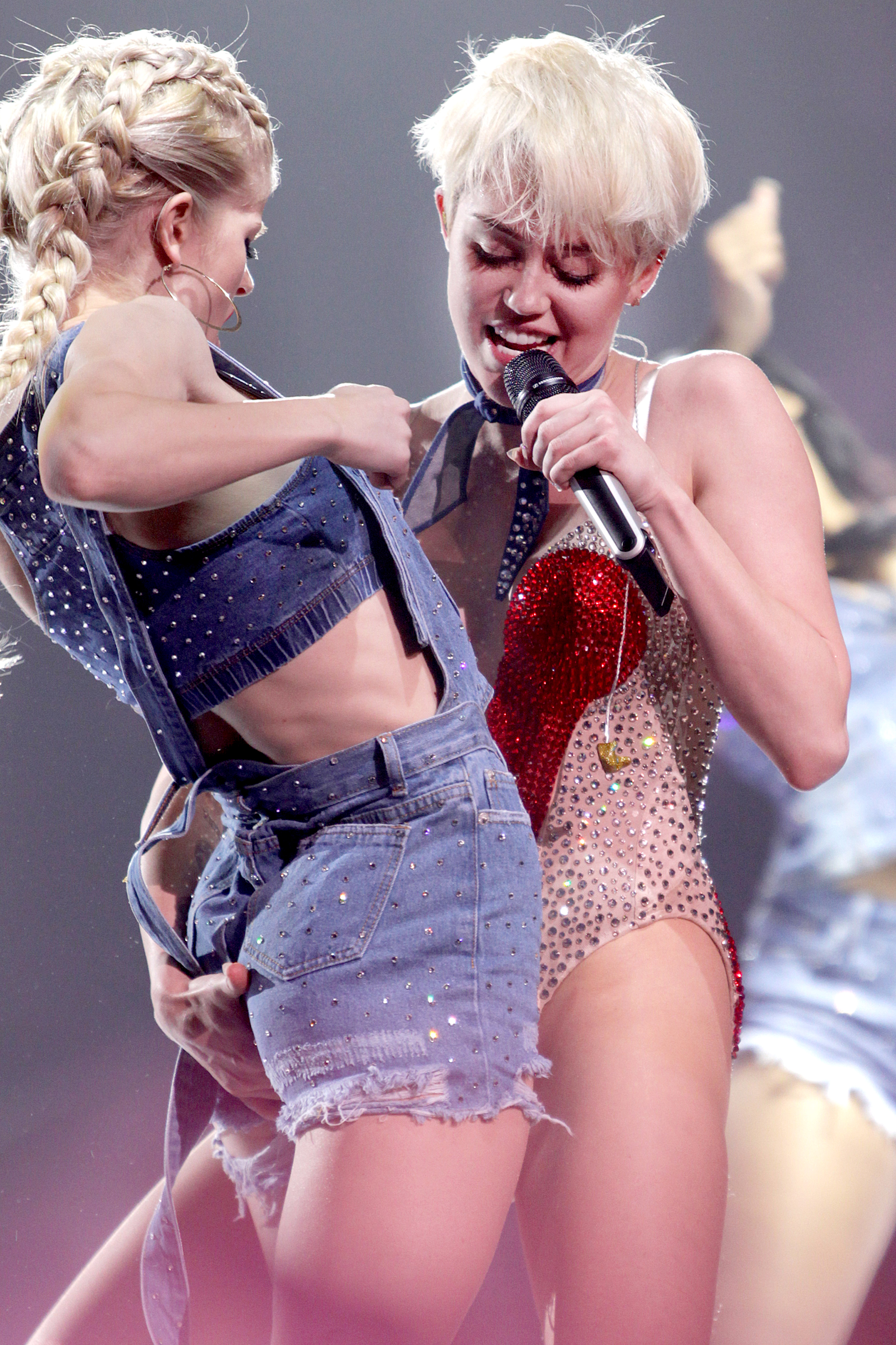 Miley Cyrus loving on a fan.
