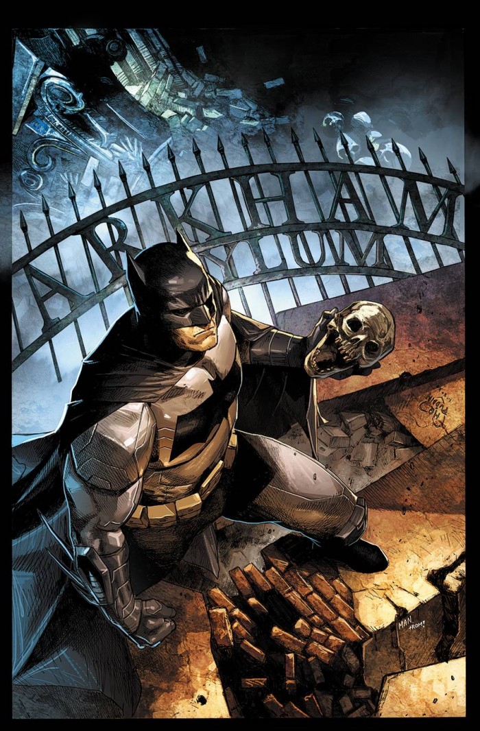 Batman holding a skull.jpg