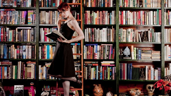 Felicia Day reads a book.jpg