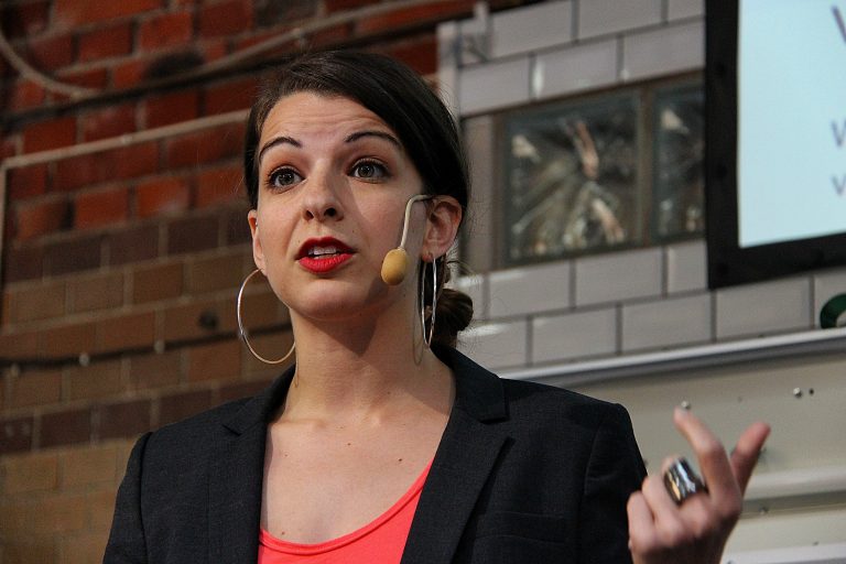 Anita Sarkeesian with a headset - MyConfinedSpace MyConfinedSpace