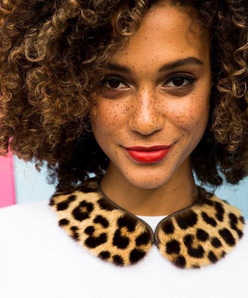 Cute freckles on dark woman.jpg