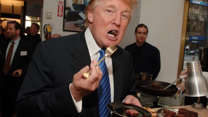 Donald Trump eating with a golden fork.jpg
