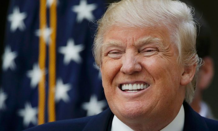 Trumps shows you his perfect teeths.jpg