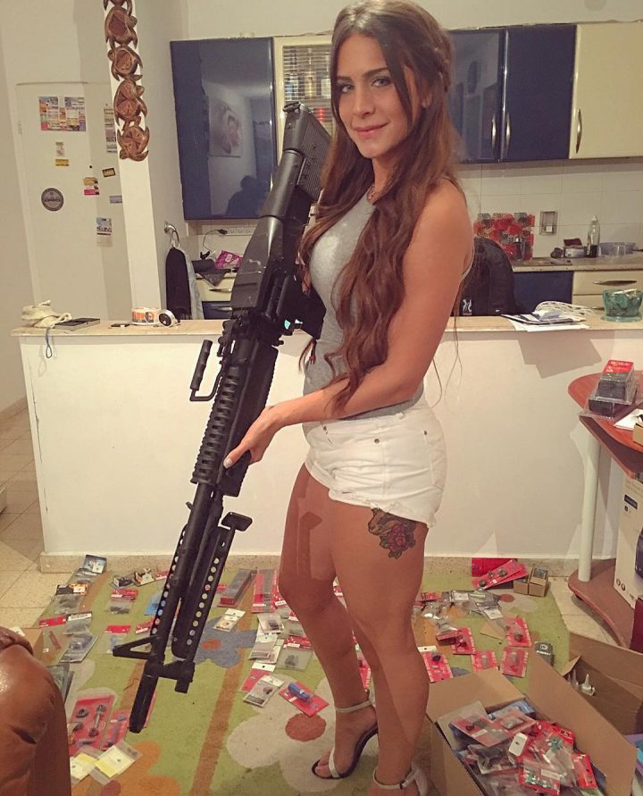 well armed woman in heels.jpg