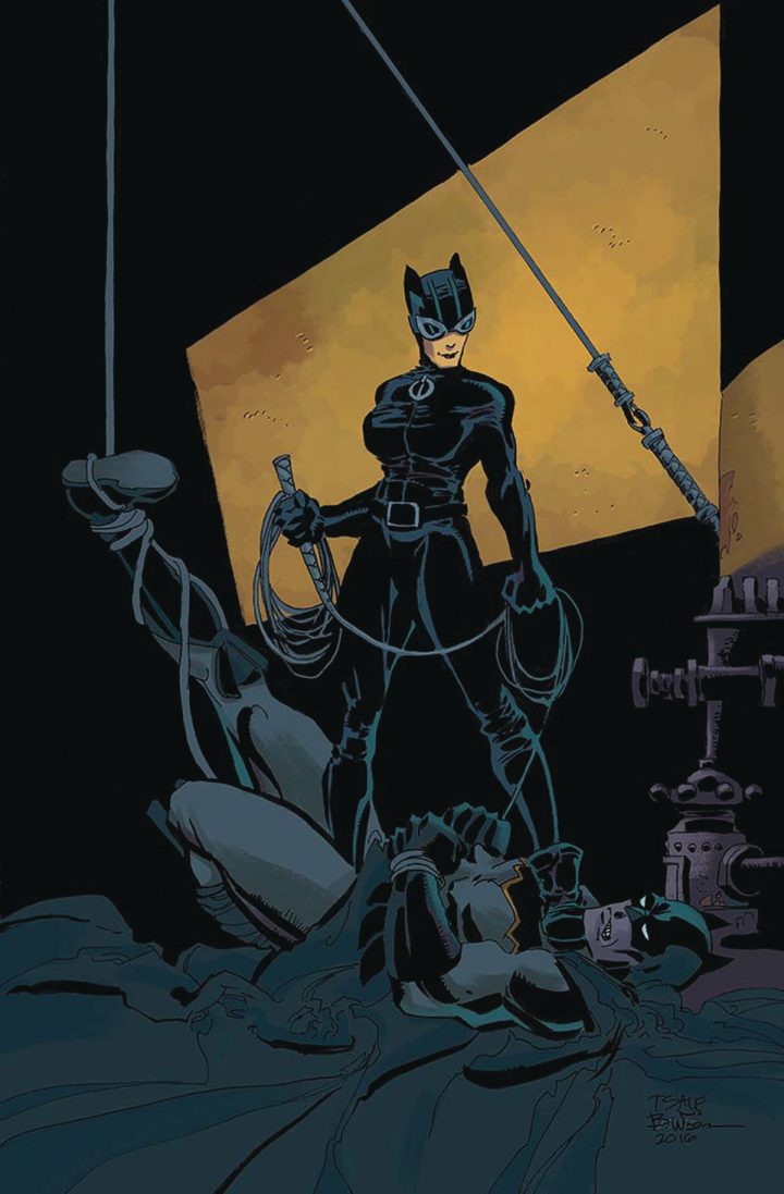 catwoman has batman tied up.jpg