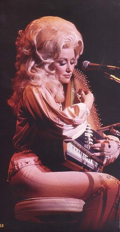 Dolly Parton playing the autoharp 1970s