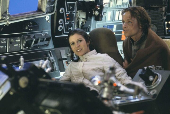 Carrie Fisher and Mark Hamill in between takes on the Falcon