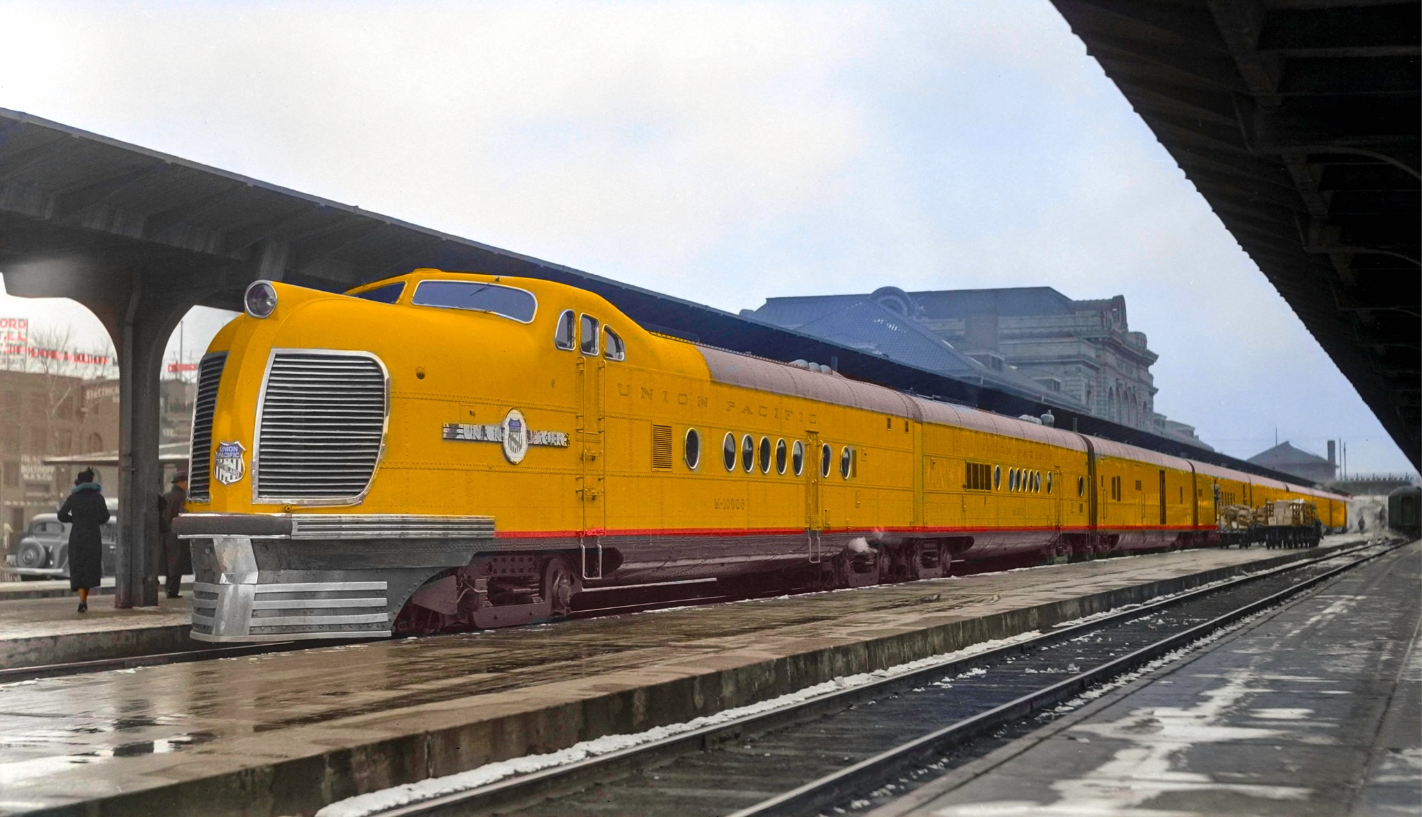 A Union Pacific train, engine number M10006 Pulling Train 112, City
