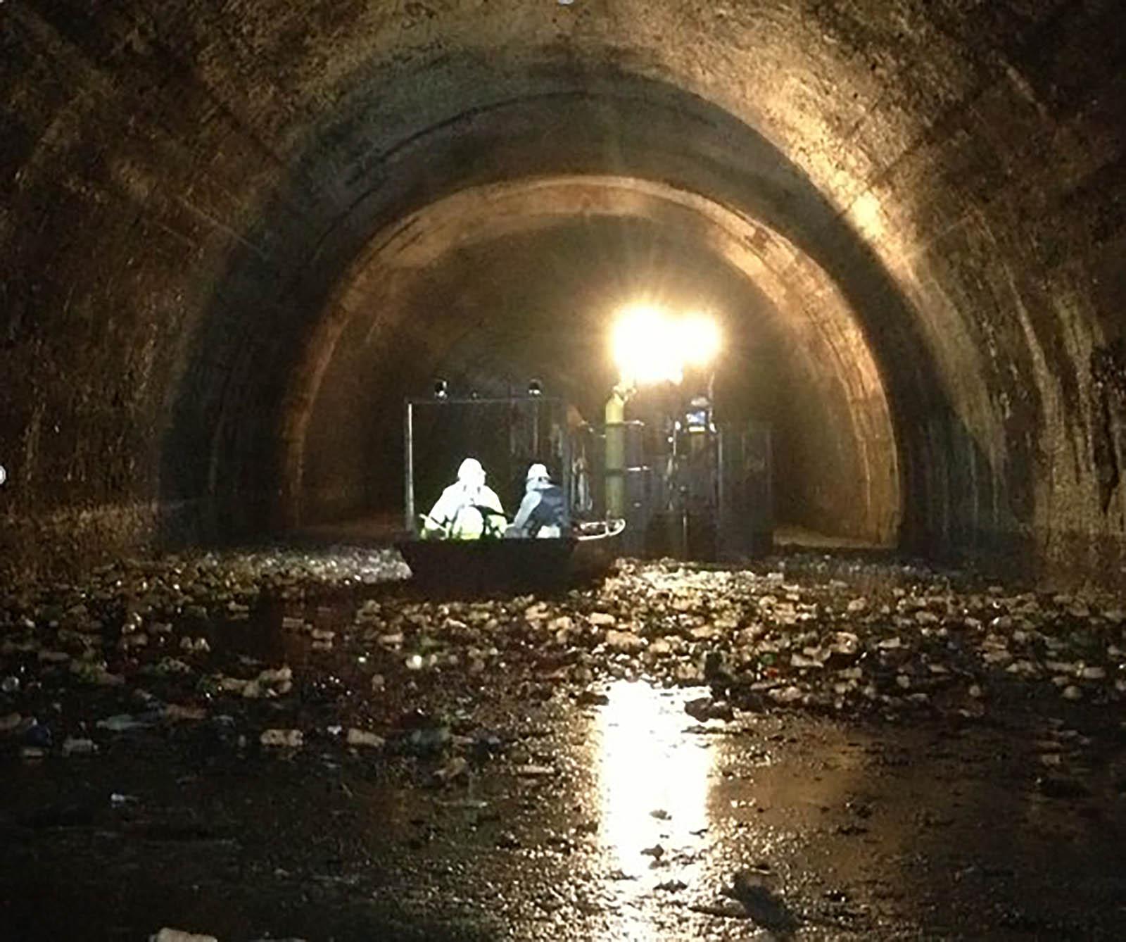 Two Milwaukee Deep Tunnel sewage workers are basically floating on a