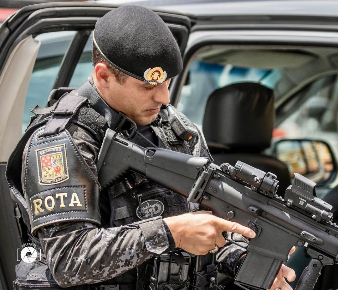 Brazilian ROTA Officer With His FN SCAR 5 56 During Urban Patrol In Brazilian ROTA Officer With His FN SCAR 5 56 During Urban Patrol In
