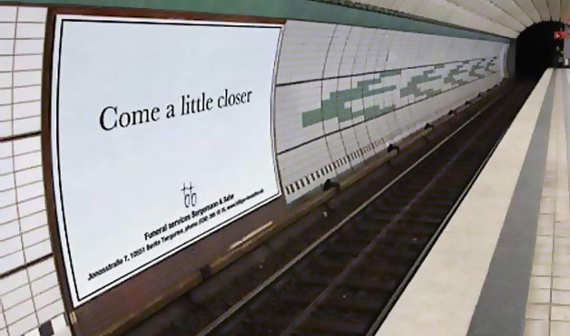 09-THE-FUNERAL-BILLBOARD-IN-THE-SUBWAY.jpg (50 KB)